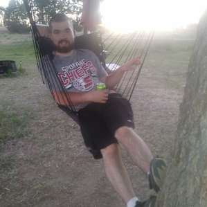 My son on a swing on one of the camp grounds