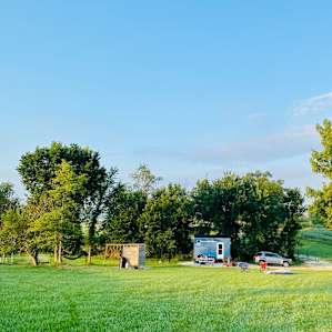 View of the tiny house from the back of the main site clearing