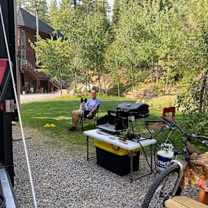 RV Spot in the Forest with a Pond