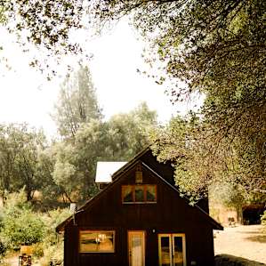 View of Alice’s home from the open space on the right side of the property. All the campsites are located on the left of the house.