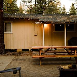A view of the guest house that is located in the back of the property.