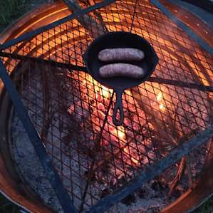 The gate at campsite #2 was very useful for cooking a variety of food items. This is a picture of some brats that I grilled up on my cast iron skillet.