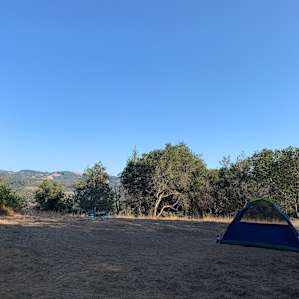 Campsite #4. Trash bin, picnic table, and view provided!