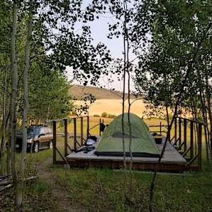 Campsite in the morning. FYI, That's a large six man tent.