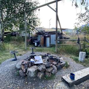 Bonfire right next to the cabin and under the Milky Way.