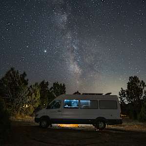 Several nice spots to park your van or RV amidst the Junipers to catch the milky way all night long.
