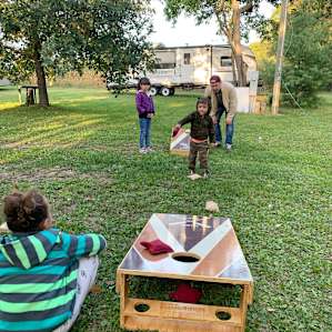 Playing one of the many lawn games available.