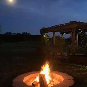 RV site with arbor and fire pit
