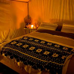 Inside the tent with little battery candles very romantic