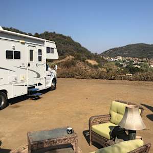 Great spot with electric and water hookups. Cute little outdoor Lounge