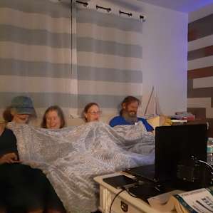 Fun at night! Sharing the sofa!