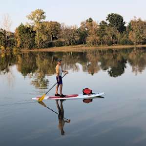 Stand up paddle board on Holiday lake. You can catch & release bass and catfish here too.