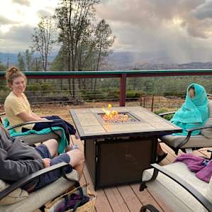 This was one of the coldest evenings they'd had in a long time and my kids LOVED it - we could see rain in the distance, and the sunset was magical! Halle even put on music for us, and the fire kept us warm.