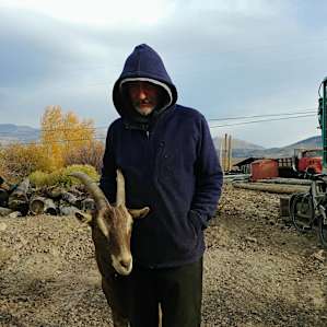 Saying good-bye to Farmer Jon and Nugget, the biggest, most ornery goat we've ever met