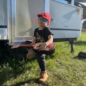 Our son played music for the dogs.