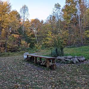 Open sky over the table and giant fire pit