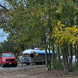 Plenty of space for our truck and 26’ trailer, with easy access to water taps, electricity, and an outdoor shower and composting toilet.