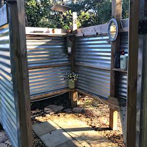 Outdoor shower. Don't worry, the door closes, plenty of privacy, gets nice and warm if you program it right. (Last thing I did again before I left from vaca! - It is that good.)