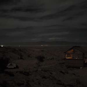 Night view of the gazebo with a full moon