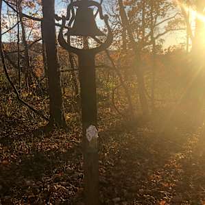 Bell by the fire circle
