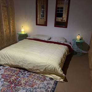 Inside the cabin, there are two futons that we pushed together. The queen sheets we brought were a perfect fit. Futons are a bit stiff, so if you prefer softer beds, plan on bringing something to lay down on them, like a foam egg-crate or feather bed.