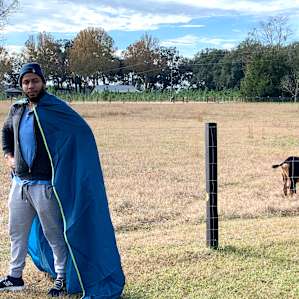 superhero and a goat