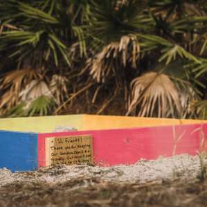 There's a well maintained sandbox for kids