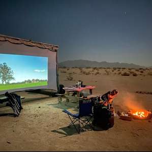 We brought our projector screen and projector for a camp-side movie