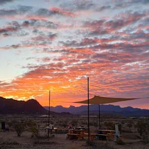 The sunrise over the mountains at this site is stunning.