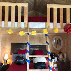 Guthrie Meadows green door cabin