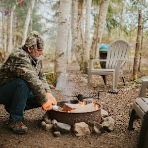 Our wonderful host starting us a fire for the evening!