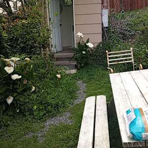 Outdoor detached bathroom with modern plumbing and electricity. Don't leave the light on at night or it will disturb the honey bees in their hives.