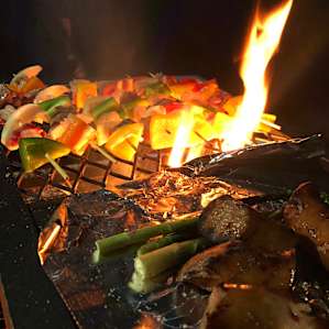 Night grilling with our outdoor cooking set. Light up a campfire for more lightening