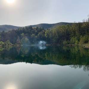 View of the campsite from the opposite side of the lake.