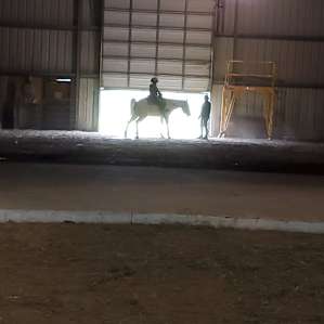 Another picture of inside the barn during the horse back riding.