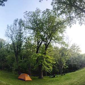 The perfect tent site beside the Little Blue River! The grounds were well-tended but respectful of the natural beauty of the land.