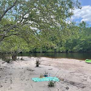 Beach on the left side of the river paddling upriver for a rest or picnic