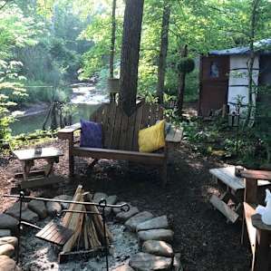 The yurt site with a view of the creek.