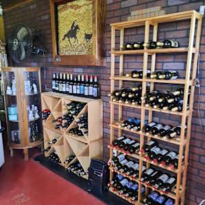 One of the walls of wines and meads for sale in the 7C's Winery store. They also have fun selection of gifts and snacks, as well as various cheeses.
