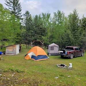 Campsite set up with shelter and changing room/compost toilet room. Very clean.