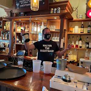 "Walter the nightmare" makes great margaritas at Oyster Rockerfellas just up the road.