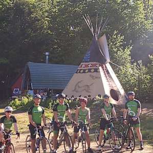 A group of bikers ready to roll out from camp