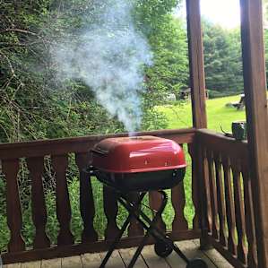 Making beyond burgers and baked potatoes on charcoal grill.