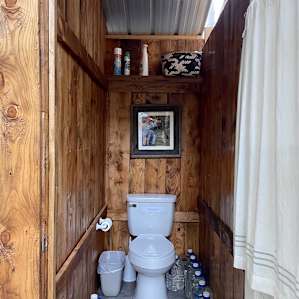 A flush toilet in the woods is here!