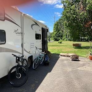 Grassy RV camping with trees