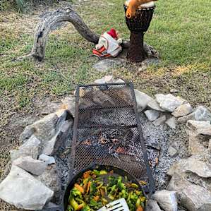 A fresh veggie stirfry that tastes sooo much better when made by the fire!