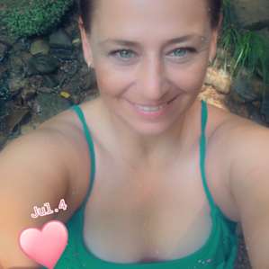 Me taking selfies in the cool refreshing creek!!