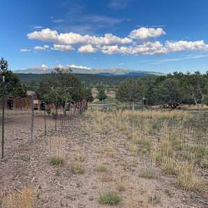 Walking down from the viewpoint, you can see the ranch on the left and if you squint you can see the front of my white van parked at my campsite in the trees on the right.