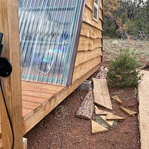 Where the rattlesnake bit my pup - Under right side of A Frame Cabin