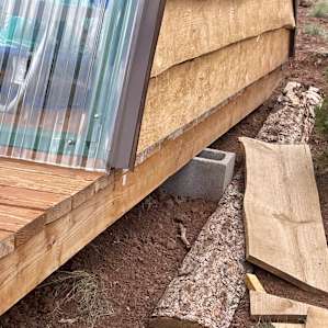 Where the rattlesnake bit my pup - Under right side of A Frame Cabin